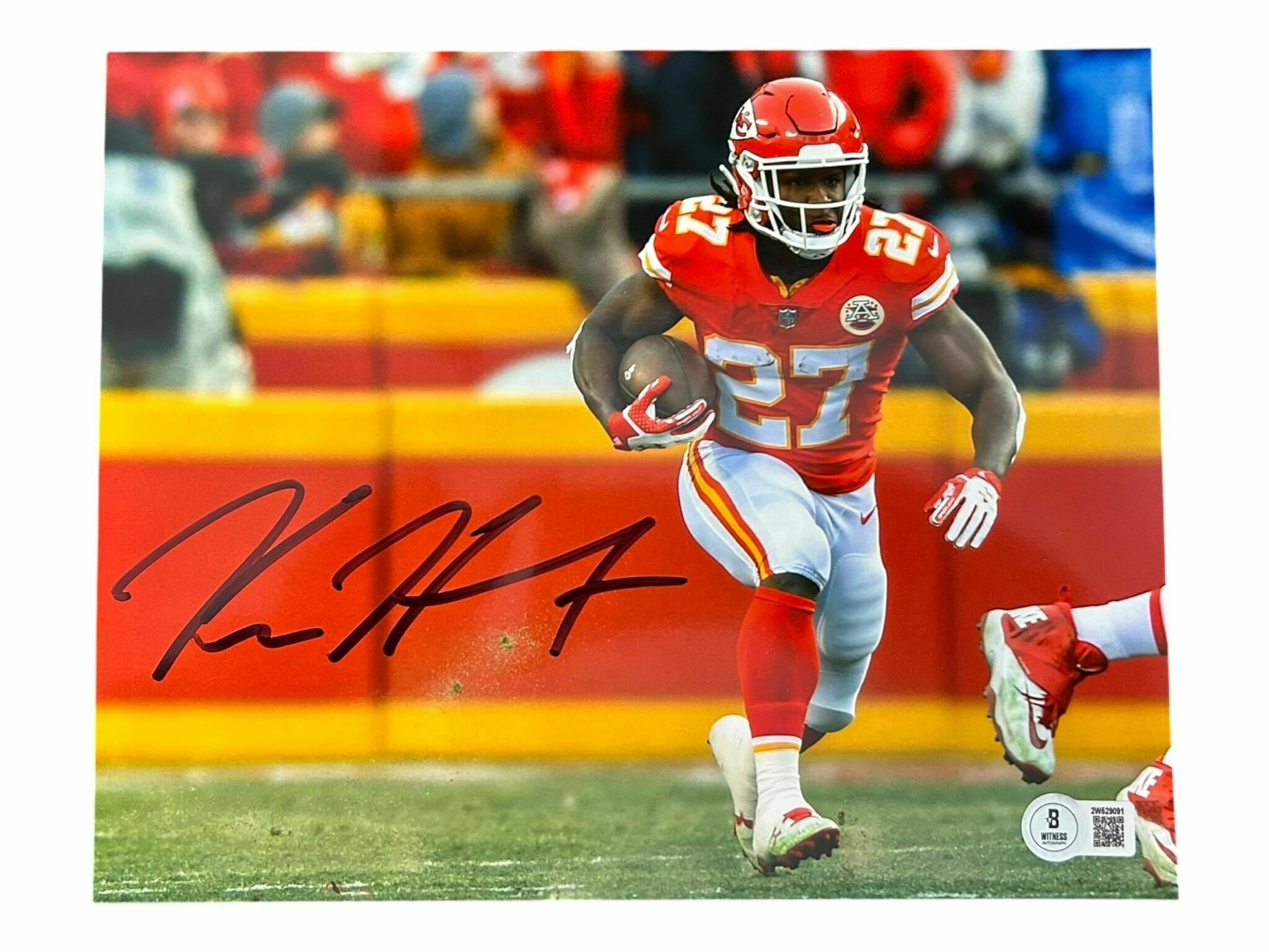 Kareem Hunt Autographed 8x10 Photo Running in Red - Beckett Authentic