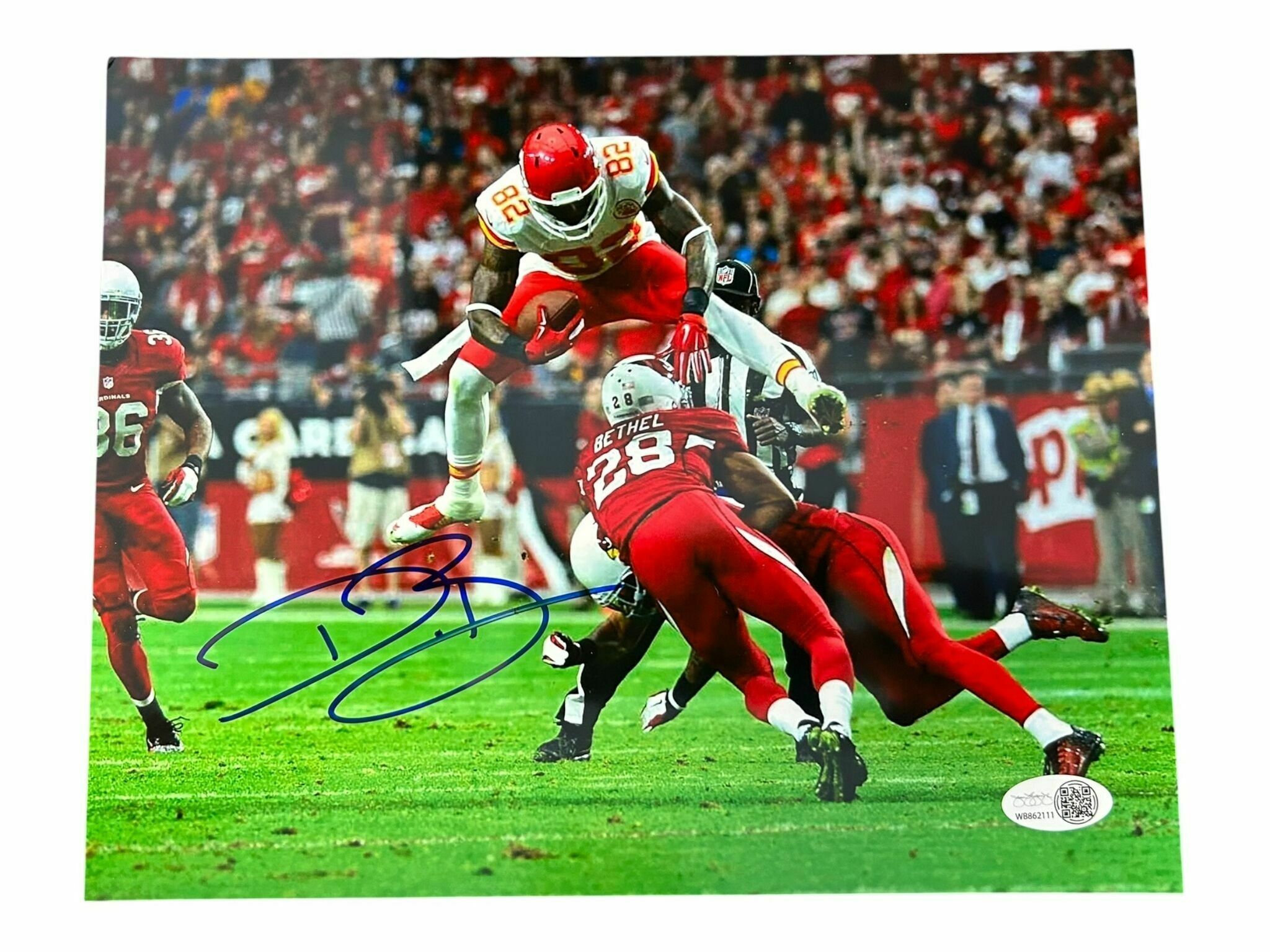Dwayne Bowe Autographed 8x10 Photo Hurdle Vs. Cardinals - JSA Authentic