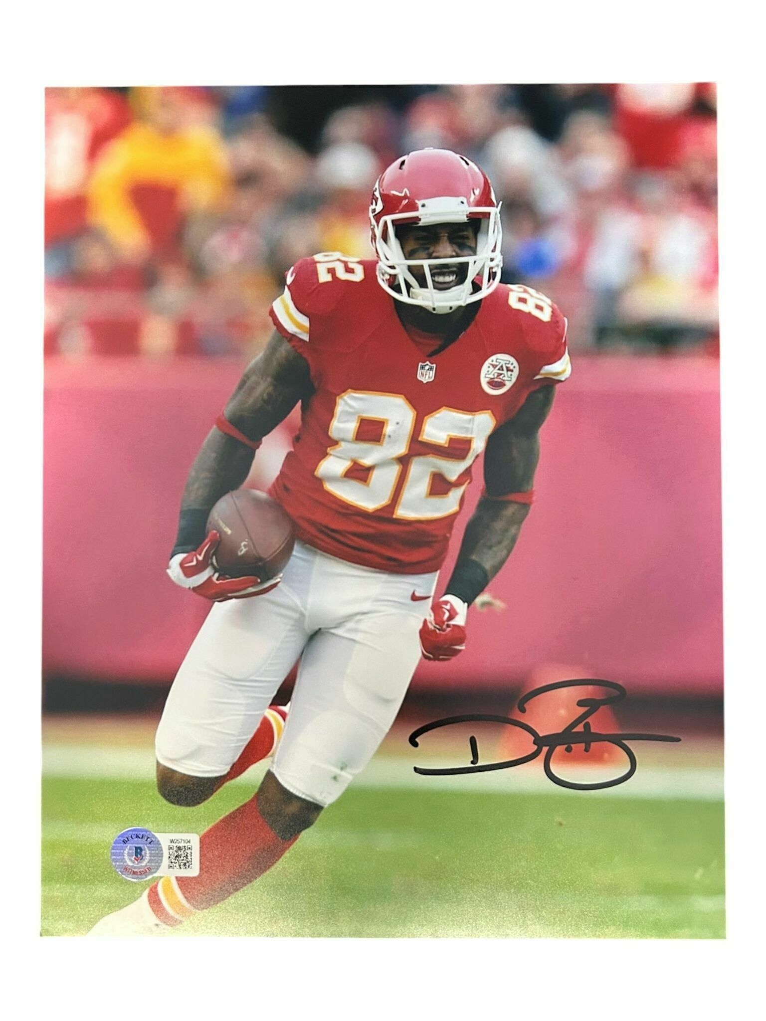 Dwayne Bowe Autographed 8x10 Photo Cutting Up Field - Beckett Authentic