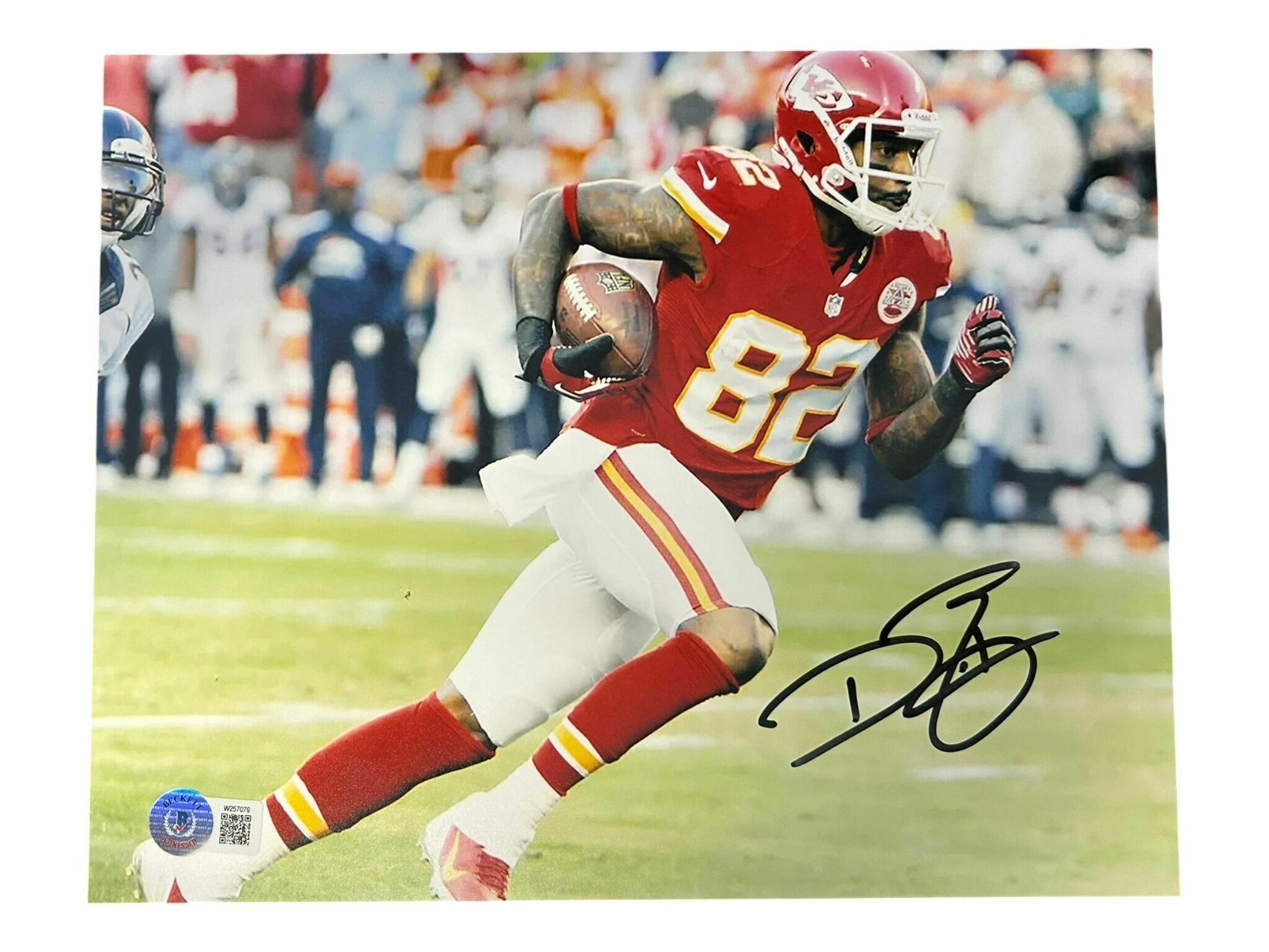Dwayne Bowe Autographed 8x10 Photo Horizontal Cutting Up Field - Beckett Authentic