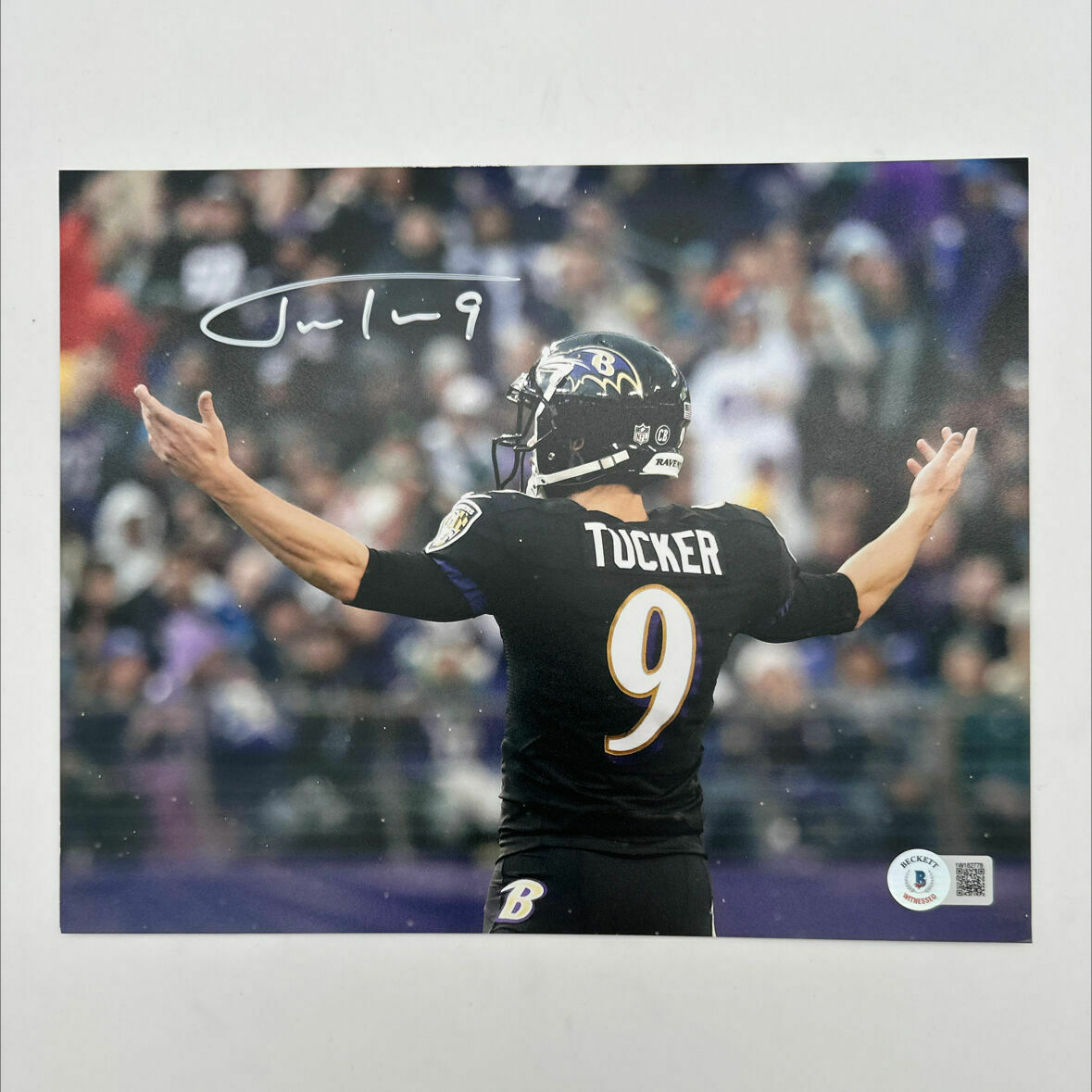 Tucker Signed 8x10 Arms Out