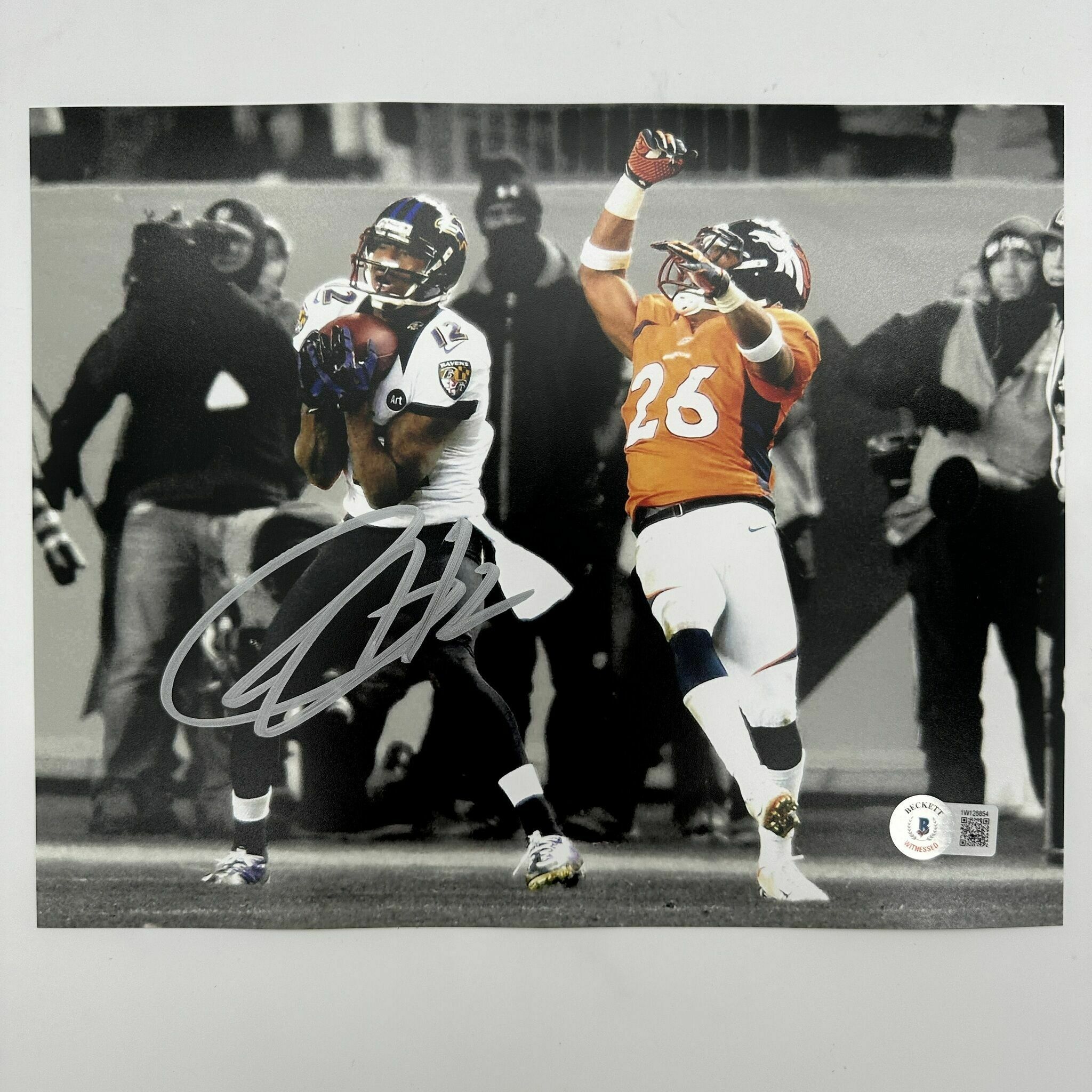 Jones Signed 8x10 Spotlight Catch