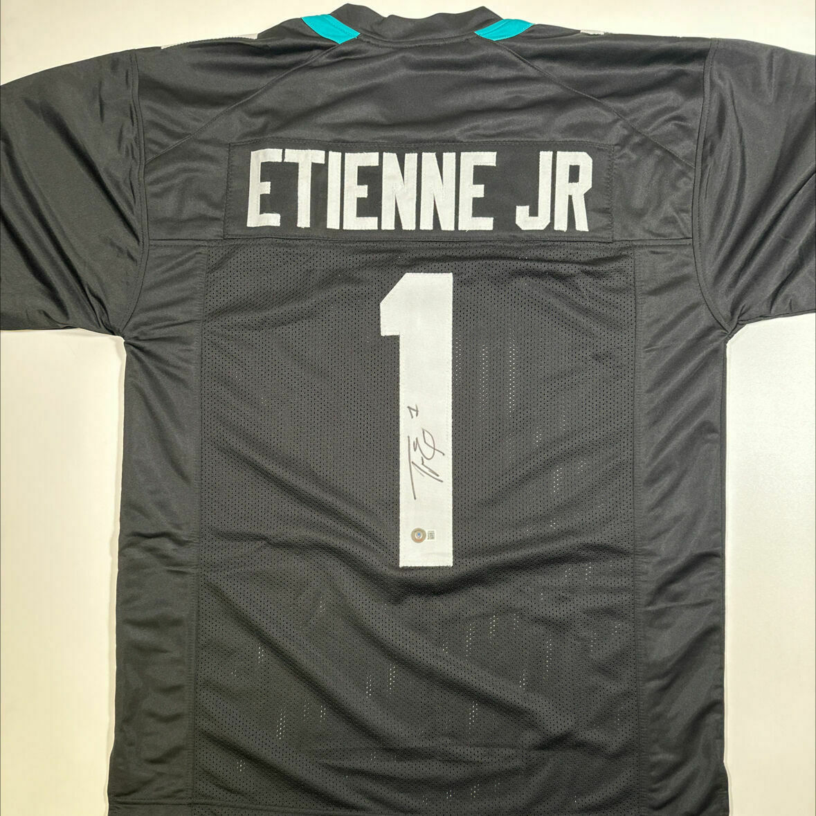 Etienne Signed Black Custom Jersey