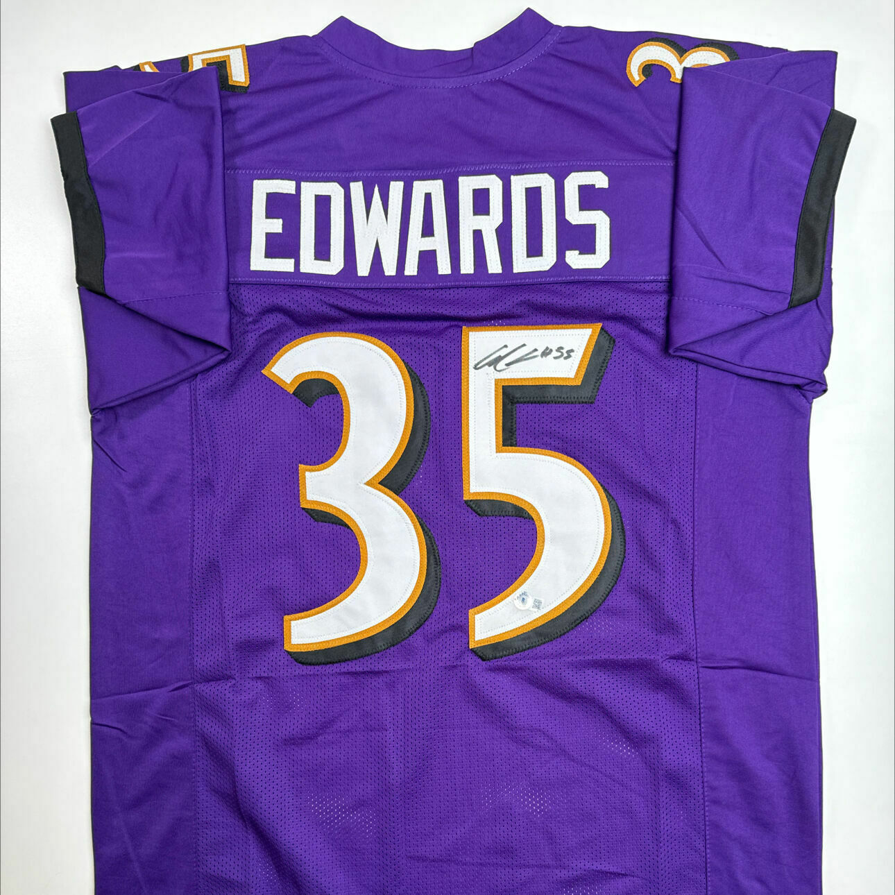 Edwards Signed Purple Custom Jersey