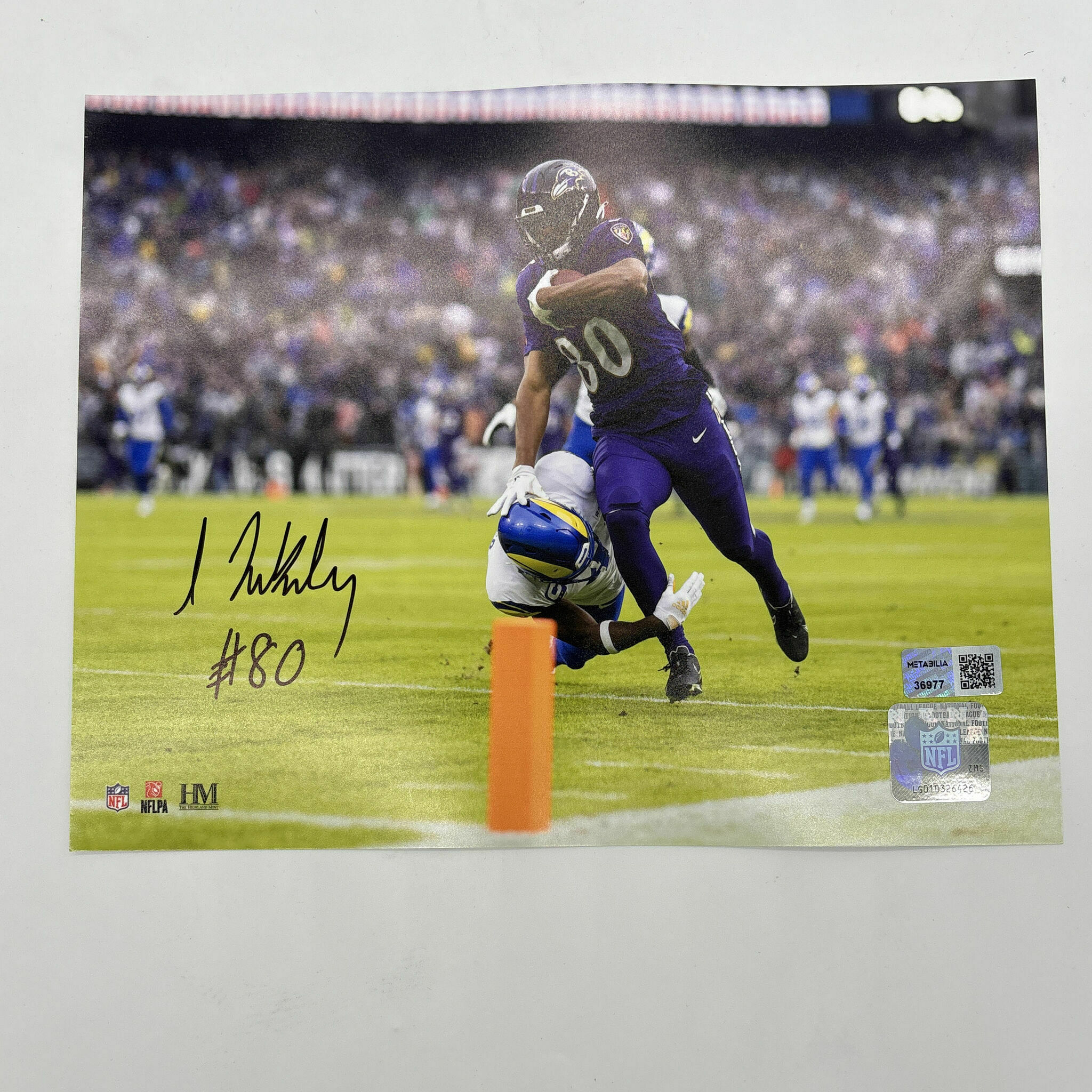 Likely Signed 8x10 Stiff Arm