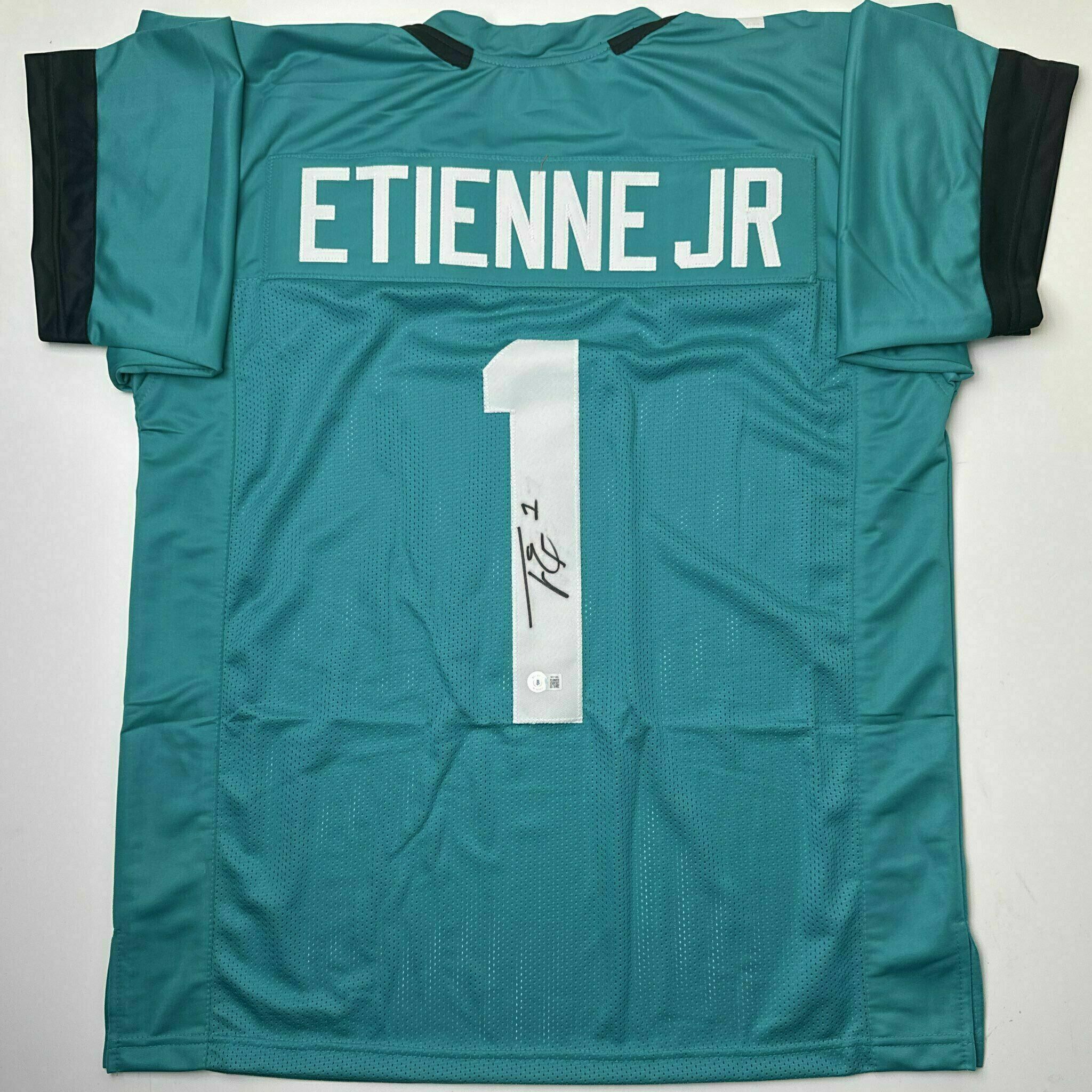 Etienne Signed Teal Custom Jersey