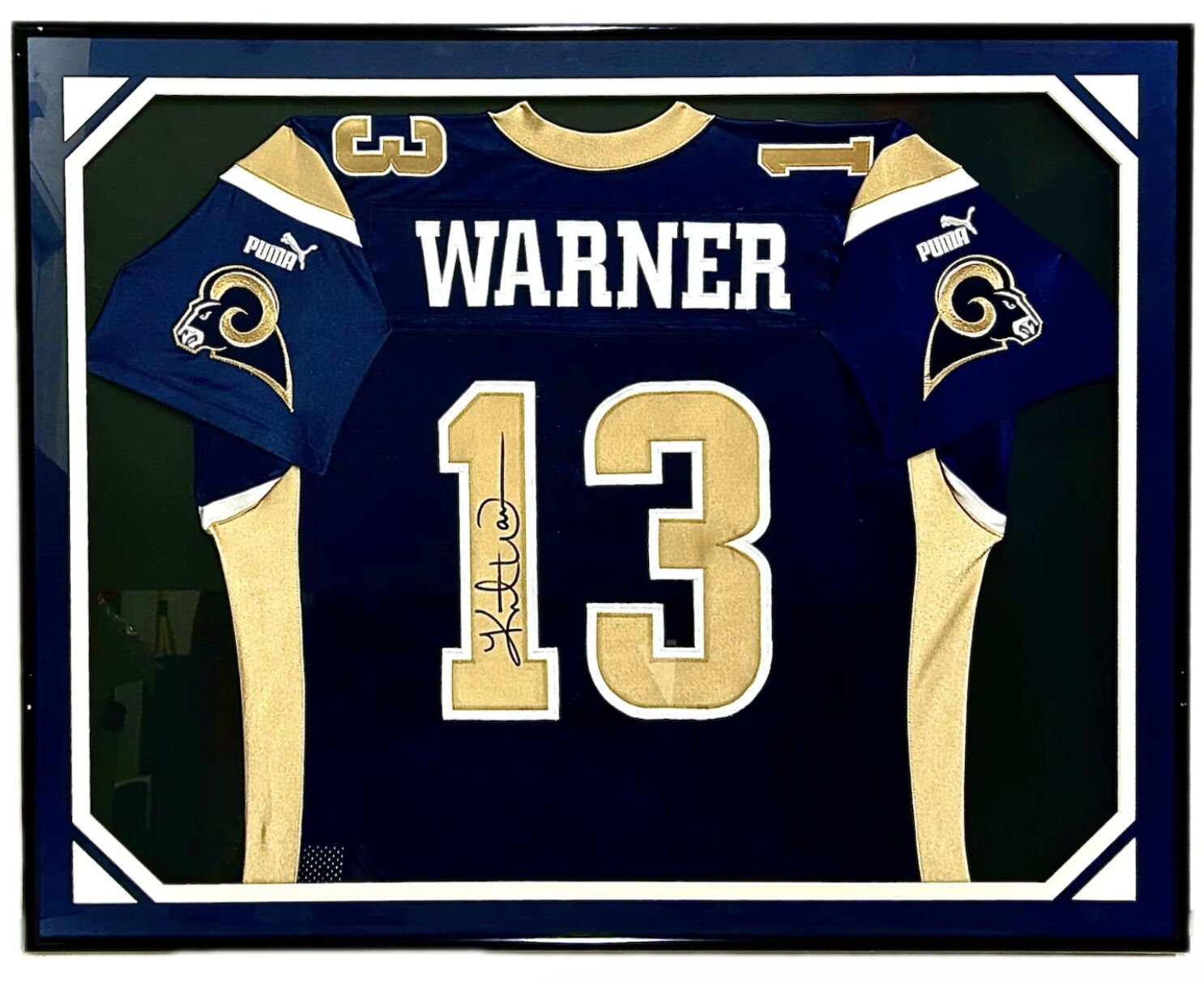 Kurt Warner Autographed St. Louis Rams 42" x 34" Framed Puma Jersey NSD Authenticated